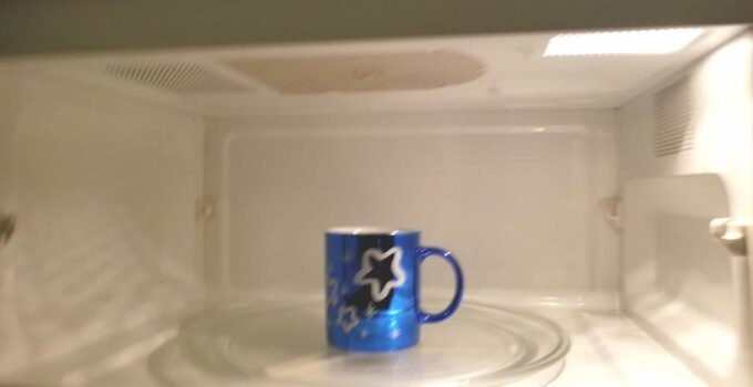 microwave warming a cup of coffee 2021 09 04 00 25 16 utc 1 1