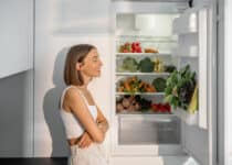 woman with healthy vegetables in the fridge 2021 09 04 12 11 48 utc 1