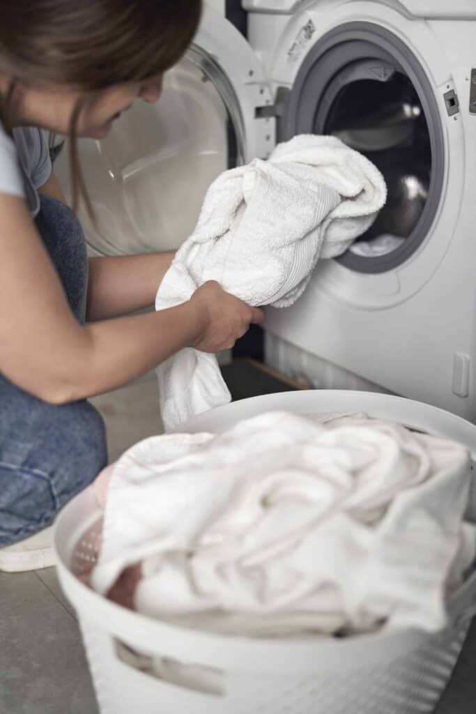 close up of caucasian woman making laundry at home 2022 04 16 16 06 10 utc 1 1