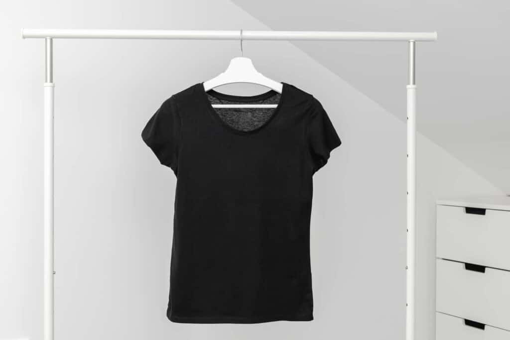 black t shirt hanging on clothing rack 2022 04 14 19 27 19 utc 1 1 1