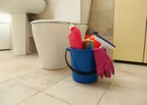 bucket with cleaning products in modern bathroom 2021 08 31 14 52 57 utc 1