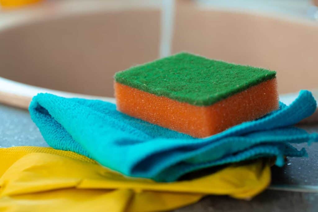 cleaning sponge and rag on kitchen counter 2021 09 03 12 22 09 utc 1 1