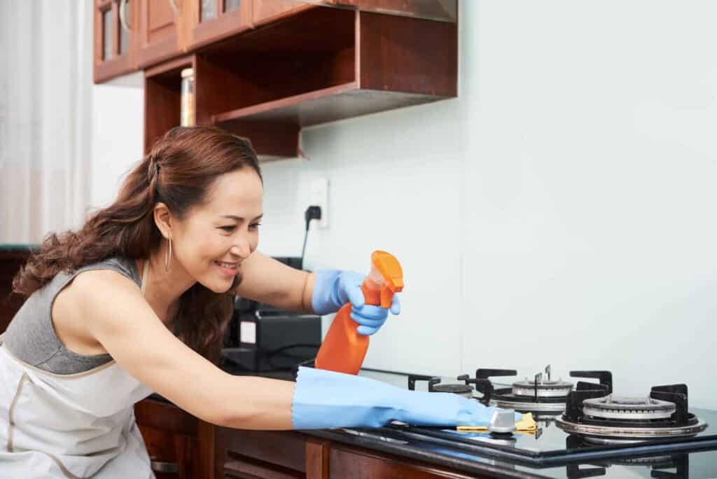housewife cleaning stove 2021 08 26 19 52 38 utc 1 1