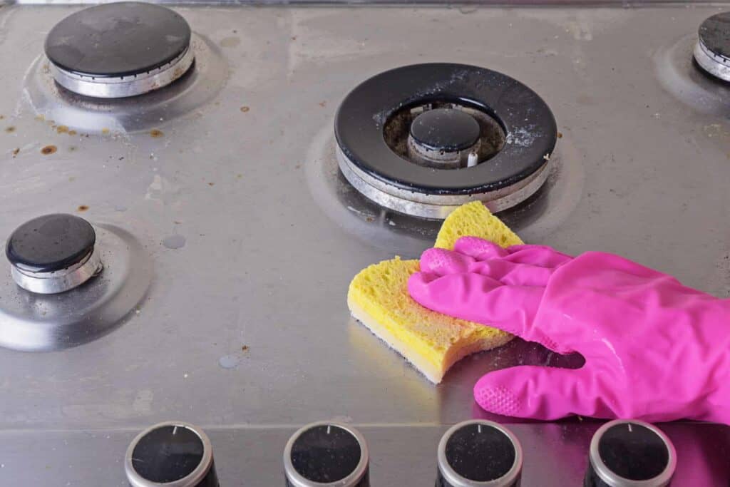 manual cleaning of stainless steel gas stove with 2021 09 01 17 13 13 utc 1 1