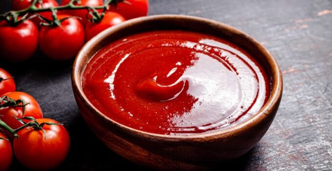 tomato sauce in a wooden plate 2021 12 15 21 47 35 utc 1 1